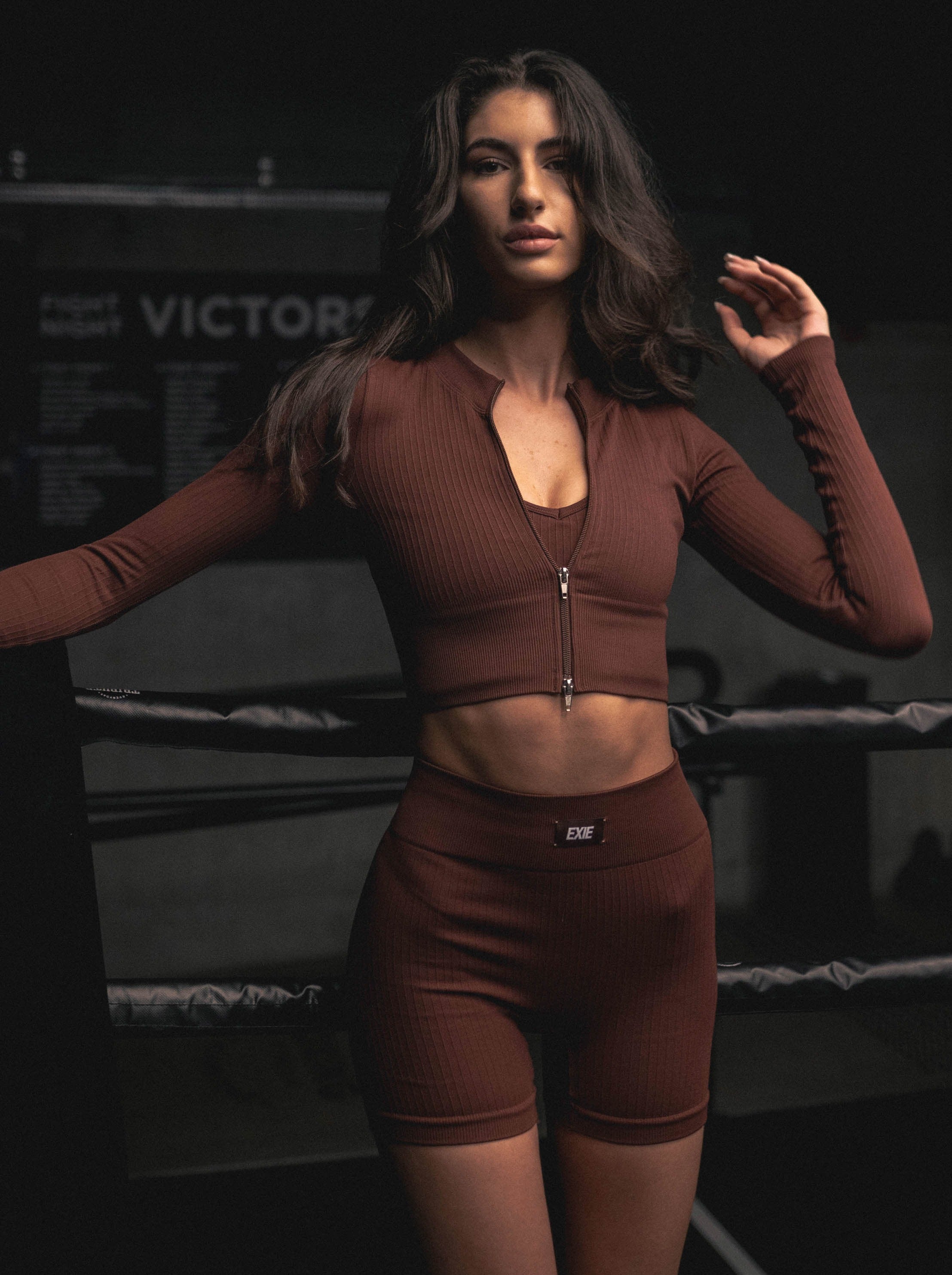 BEND LONG SLEEVE ZIP FRONT TOP - SIENNA